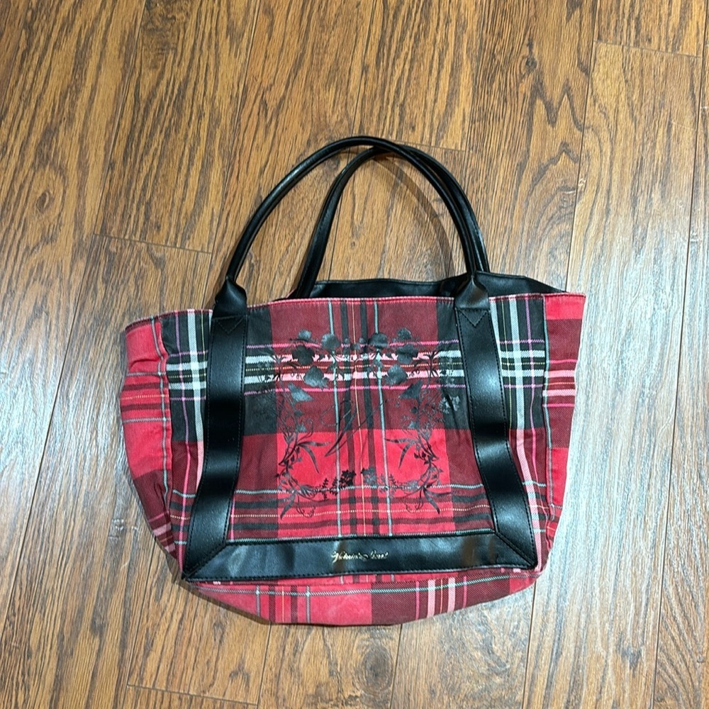 Victoria's Secret red plaid holiday tote bag featuring black faux-leather trim